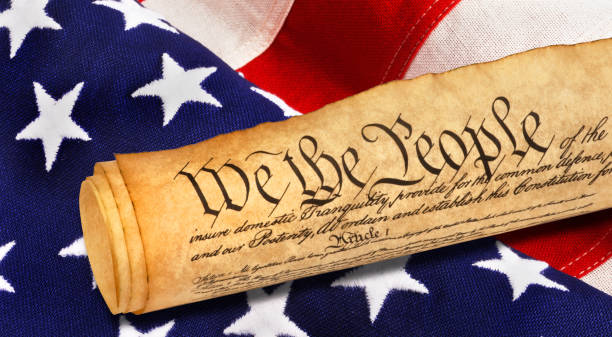 We the People. We the People with American flag. declaration of independence stock pictures, royalty-free photos & images