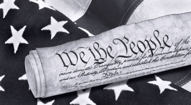 We the People. We the People with American flag in black and white. 1776 american flag stock pictures, royalty-free photos & images