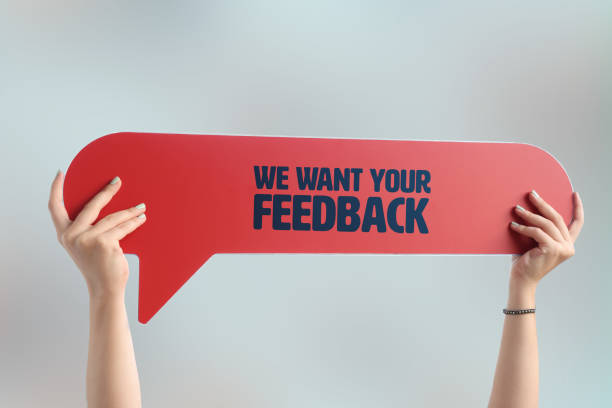 We want your feedback word with speech bubble stock photo