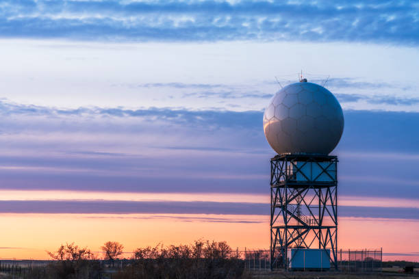 Weather radar tower in sunset stock photo