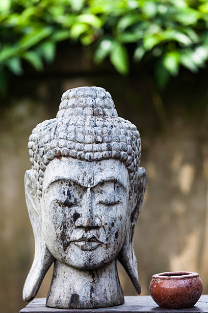 Weathered Carved Buddha Head stock photo