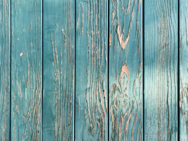 weathered green painted old wooden fence wall peeling paint natural floor aged retro style stock photo