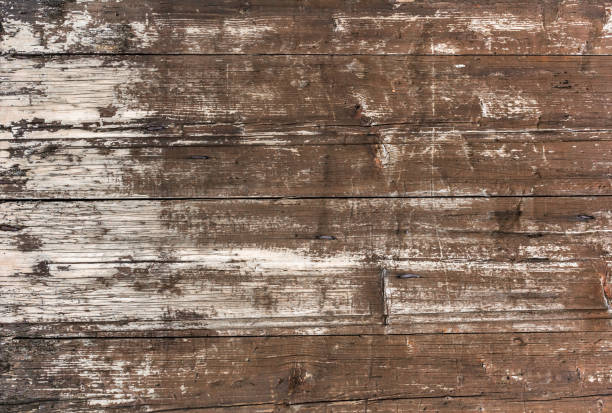 Weathered wooden background Old wooden plankswith peeling paint. Background of old painted wood fragment. weathered stock pictures, royalty-free photos & images