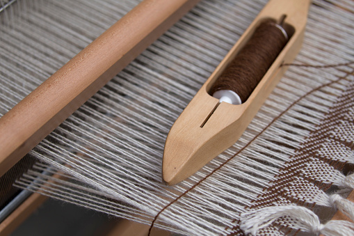 Weaving Shuttle On A Loom Stock Photo - Download Image Now - iStock