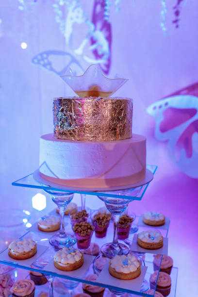 Wedding cake and candy bar. wedding cake and cupcakes.