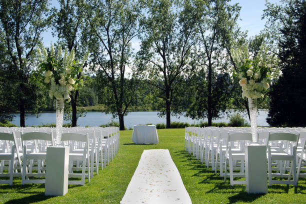 Wedding Ceremony A wedding ceremony is set up in a suburban park.  More wedding images wedding ceremony stock pictures, royalty-free photos & images