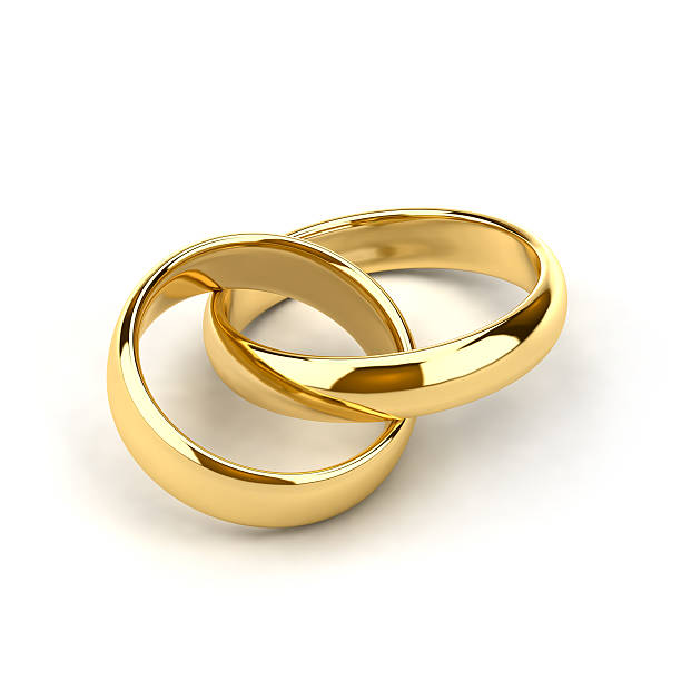 Wedding rings Two wedding rings, like links in the chain are interconnected wedding ring stock pictures, royalty-free photos & images