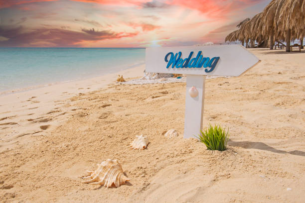 Wedding sign on a tropical beach paradise stock photo