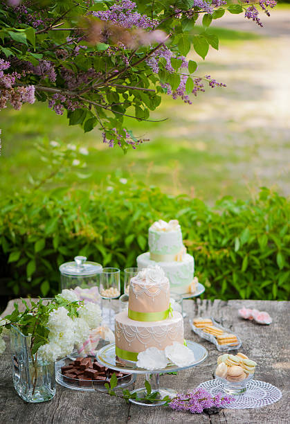 Weeding cakes on the garden table. stock photo
