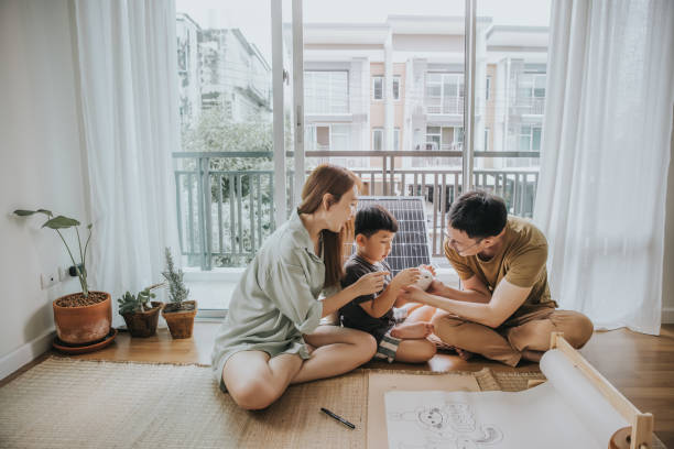 Weekend activity of Asian family playing with rabbit-stock photo stock photo