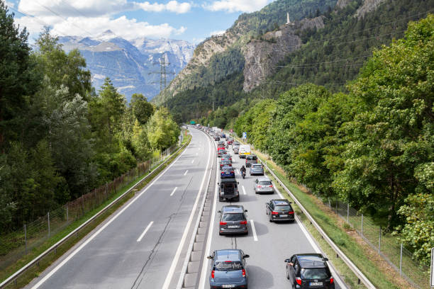 Weekend traffic jam on the highway towards Swiss Alps creation regions stock photo