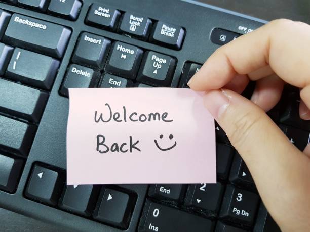 Welcome back employee to office during Covid-19 pandemic stock photo