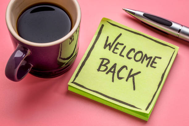 welcome back on a sticky note welcome back - handwriting on a sticky note with a cup of coffee back stock pictures, royalty-free photos & images