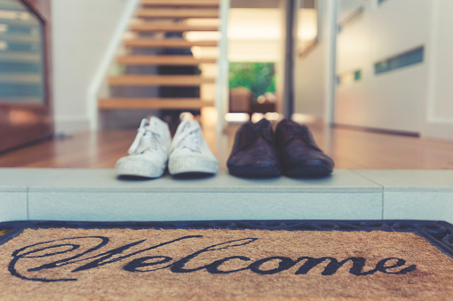 Welcome Mat At The Open Front Door Stock Photo - Download Image Now ...