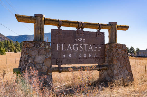 Welcome Sign in Flagstaff, Arizona FLAGSTAFF, AZ - OCTOBER 24, 2017: Welcome sign on the outskirts of Flagstaff, Arizona flagstaff arizona stock pictures, royalty-free photos & images