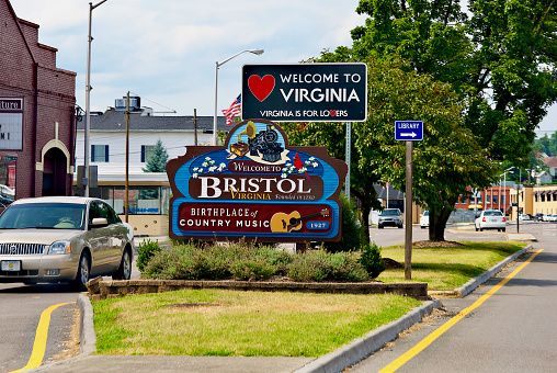 Bristol, Virginia / USA - July 19, 2018: Close-up of a “Welcome to Bristol, Virginia” sign and “Welcome to Virginia” sign.