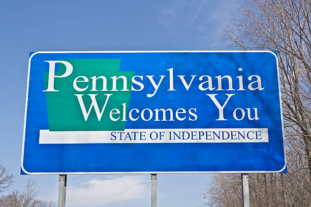 Welcome to Pennsylvania sign best bare trees stock photo