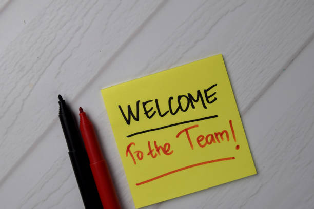 Welcome To The Team! text on sticky notes with office desk. Welcome To The Team! text on sticky notes with office desk. greeting stock pictures, royalty-free photos & images