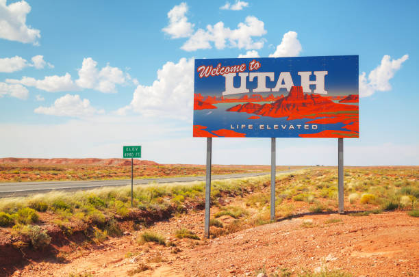 Welcome to Utah road sign Welcome to Utah road sign at the state border utah photos stock pictures, royalty-free photos & images