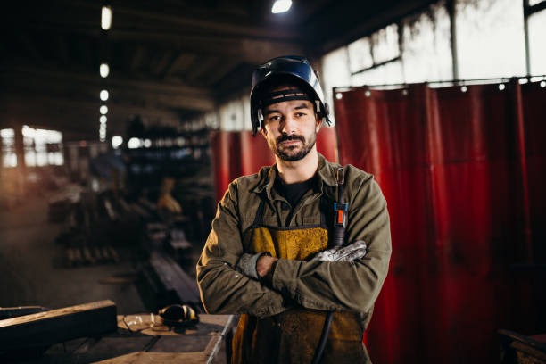 Welder working in a factory stock photo
