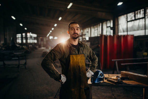 Welder working in a factory stock photo