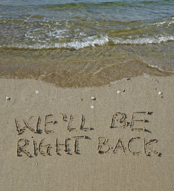 We'll be right back text stock photo