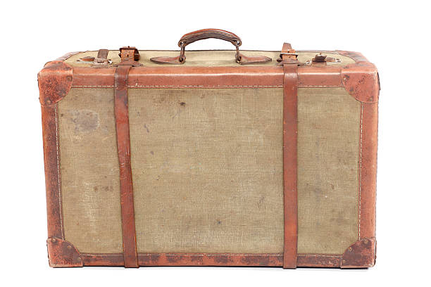 Well-Traveled Vintage Suitcase XXXL stock photo