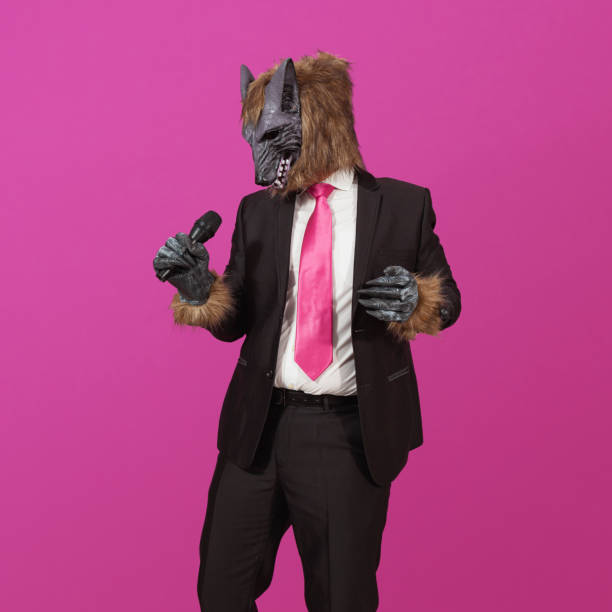 A werewolf singing, looking to the side stock photo