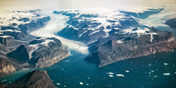 Western coast of Greenland, aerial view of glacier,  mountains and ocean Western coast of Greenland, aerial view of glacier,  mountains and ocean greenland stock pictures, royalty-free photos & images