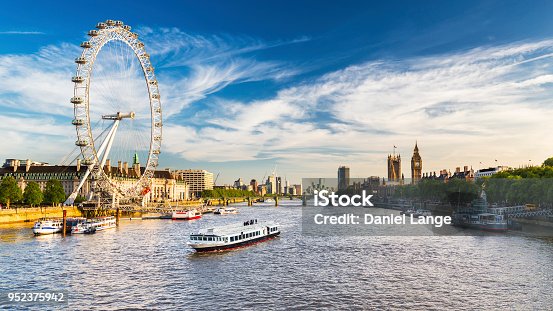 istock Westminster Parliament, Big Ben and the Thames with blue sky 952375942