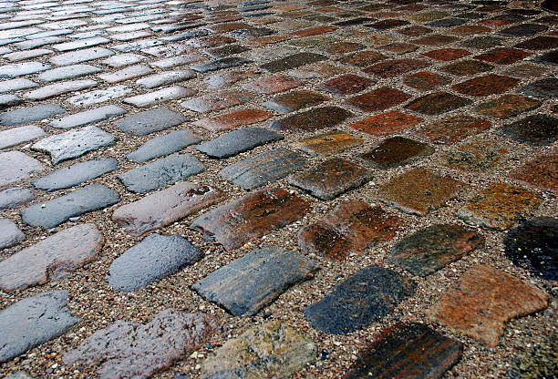 Wet cobblestones stock photo