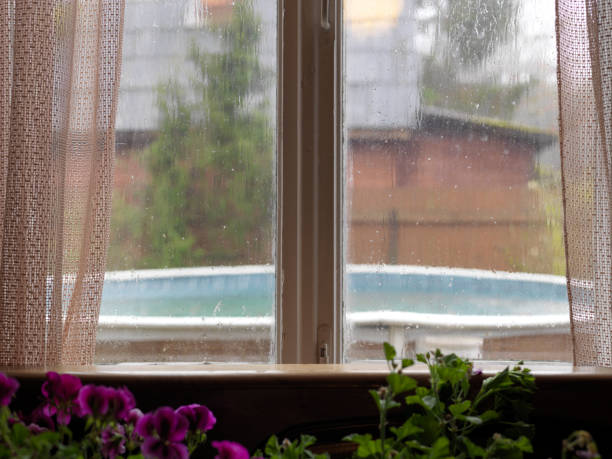 wet window glass stock photo