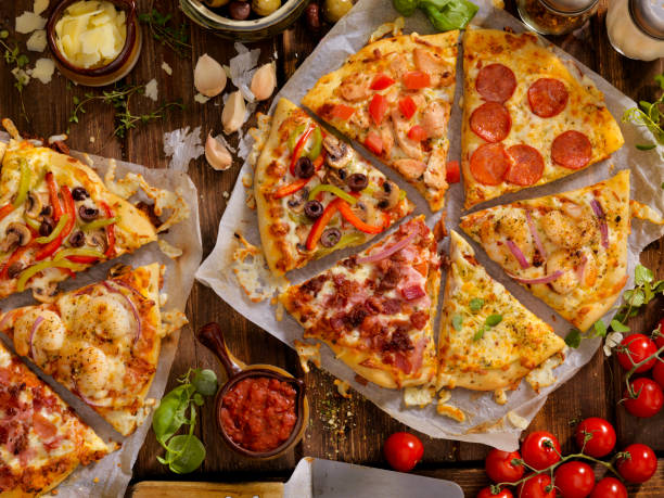 What's on your Pizza? Pepperoni, All Meat, Three Cheese, Vegetarian, Grilled Shrimp and Onions or Maybe BBQ Chicken spread food photos stock pictures, royalty-free photos & images