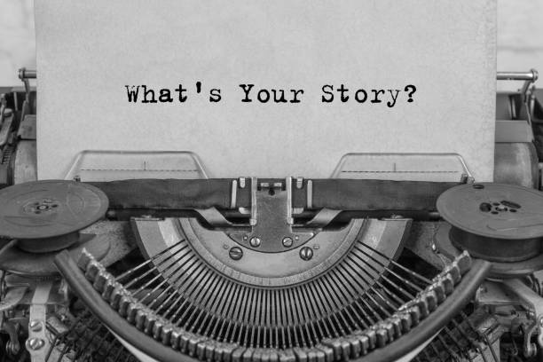 what's your story? The text is typed on paper with an old typewriter, a vintage inscription, a story of life. stock photo