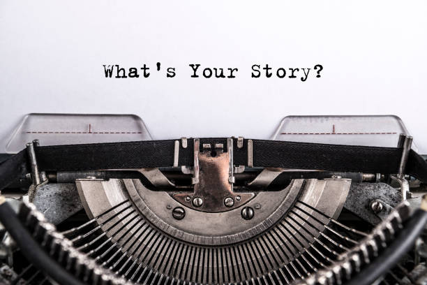 what's your story? The text is typed on paper with an old typewriter, a vintage inscription stock photo