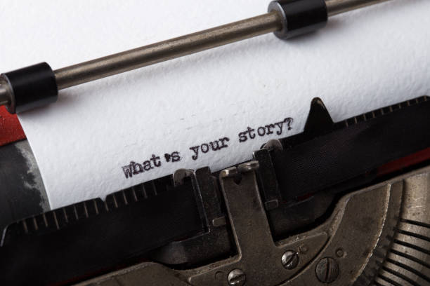 what's your story? The text is typed on paper with an old typewriter, a vintage inscription, a story of life. stock photo