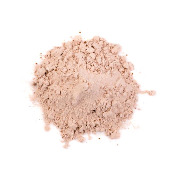 Whey cocoa protein powder for brown fitness shake isolated Whey cocoa protein powder for brown fitness shake isolated on white background top view. Chocolate supplement powder pile close up pea protein powder stock pictures, royalty-free photos & images