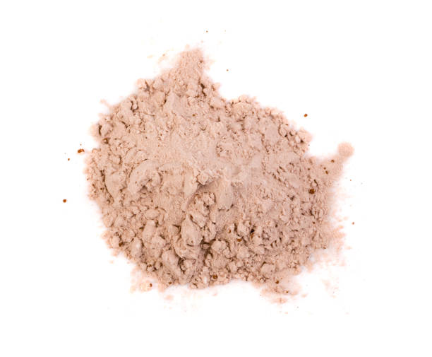 Whey cocoa protein powder for brown fitness shake isolated Whey cocoa protein powder for brown fitness shake isolated on white background top view pea protein powder stock pictures, royalty-free photos & images