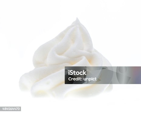 istock Whipped cream isolated on white background 484564470