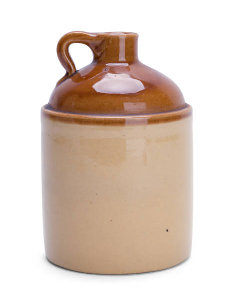 Whiskey Jug Vintage Whiskey Jar Isolated on a White Background. jug stock pictures, royalty-free photos & images