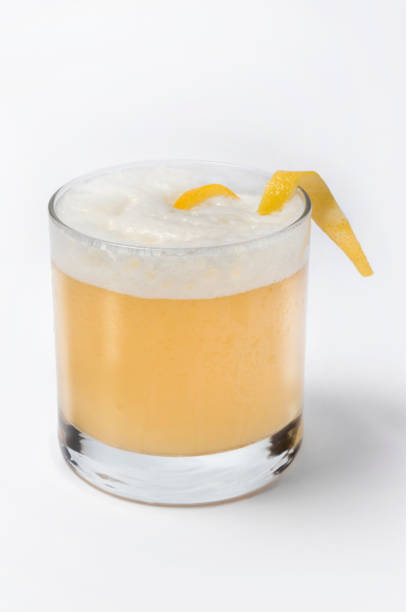 Whiskey Sour Cocktail. Famous cocktail made with egg white and lemon juice sour taste stock pictures, royalty-free photos & images