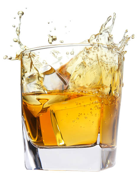 whiskey splash stock photo