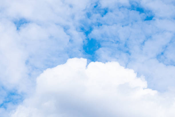 white airy porous cloud on blue sky with copy space white airy porous cloud on blue sky with copy space. your free porn.us stock pictures, royalty-free photos & images