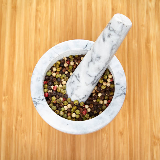 White and gray marble mortar and pestle stock photo