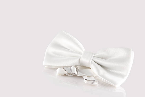 white bow tie close up stock photo