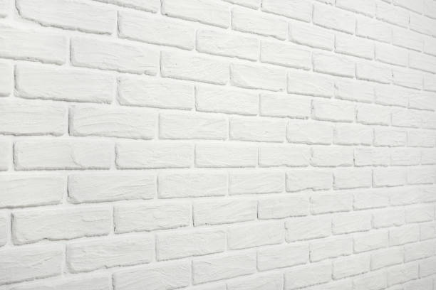 white brick wall, angle view, abstract background photo stock photo