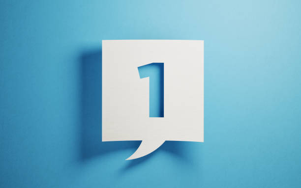 White Chat Bubble On Blue Background White chat bubble on  blue background. Number one writes on chat bubble. Horizontal composition with copy space. number 1 stock pictures, royalty-free photos & images
