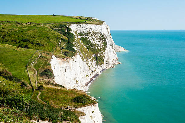 White Cliffs of Dover on a clear sunny day The Chalky White Cliffs of Dover in Kent, England english channel photos stock pictures, royalty-free photos & images