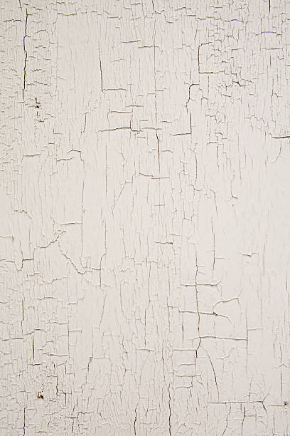 White crackled/chipping paint background An old crackled painted wood surface peeling off stock pictures, royalty-free photos & images