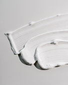 istock White cream texture on a white background. 1322486711